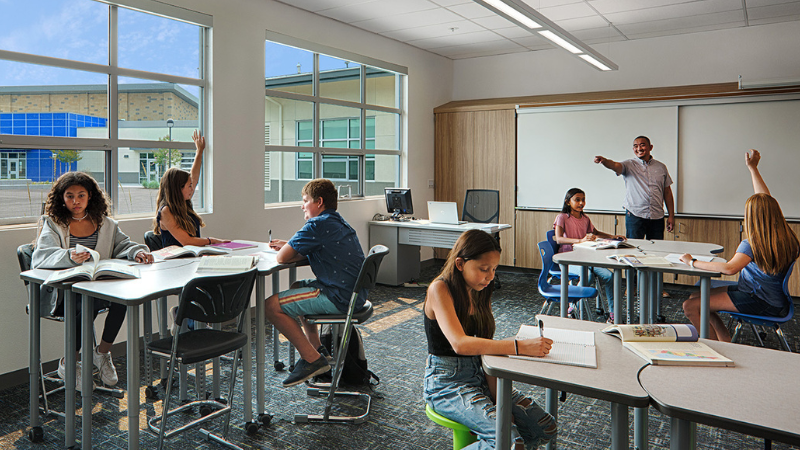 Students learning in  a new classroom